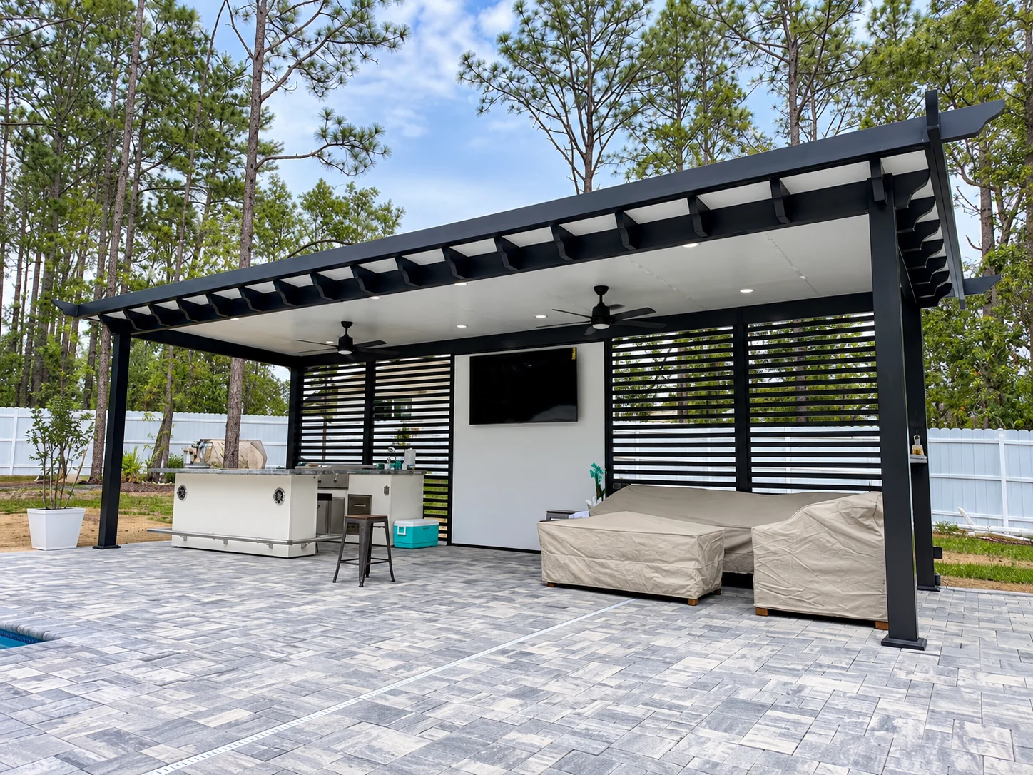 Completed PAZ pergola beside a pool in Naples